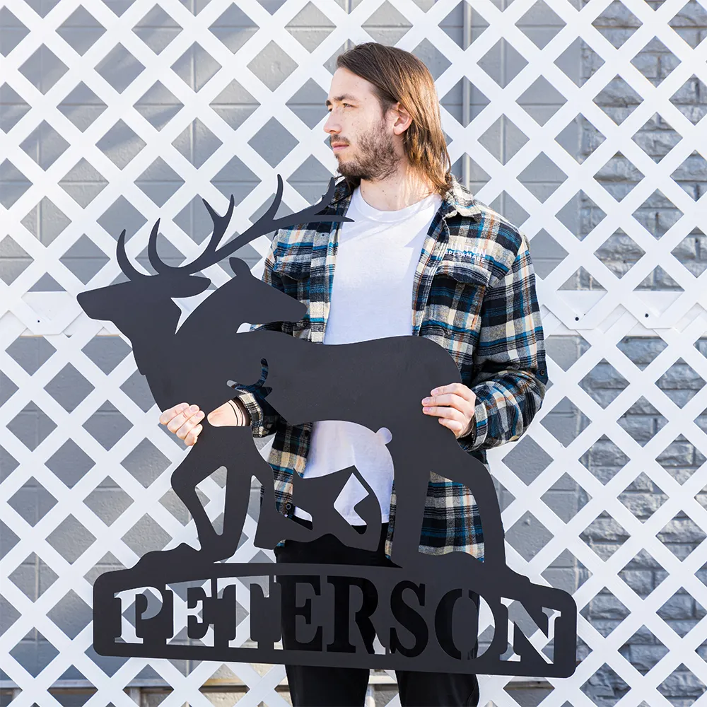 GUY HOLDING STEEL SIGN